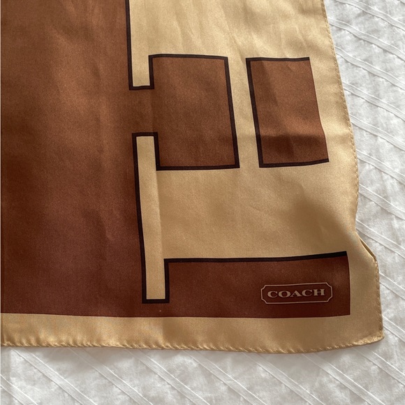 Coach silk scarf. Tan and brown logo print. Great condition. - Picture 1 of 8